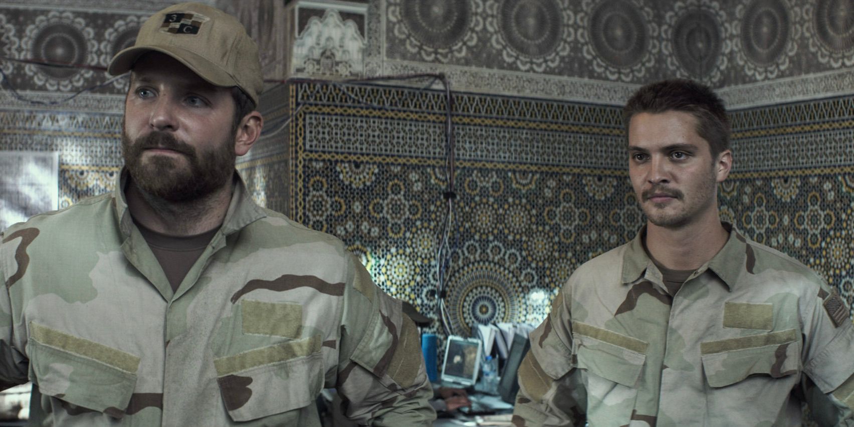 Bradley Cooper and Luke Grimes in American Sniper