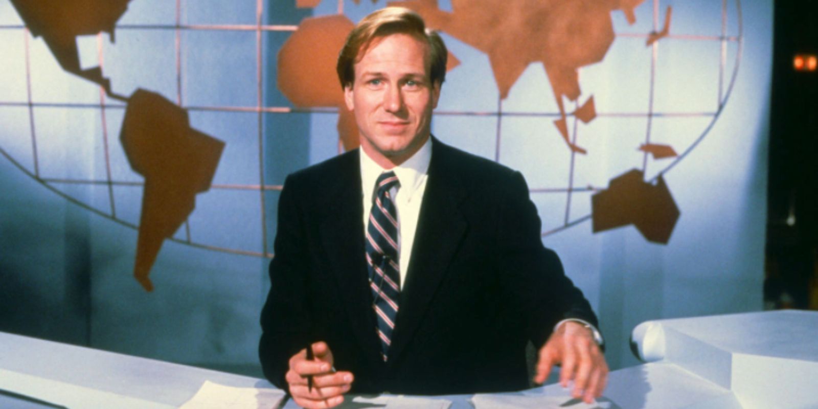Tom in a news room in Broadcast News