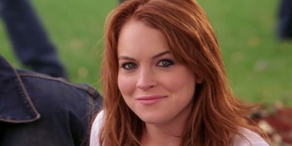 Cady Heron smiles in a naughty way in Mean Girls