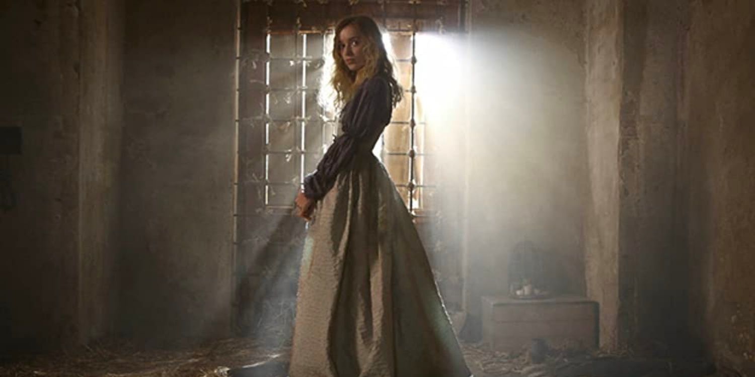 Camille silhouetted against windows in The Musketeers