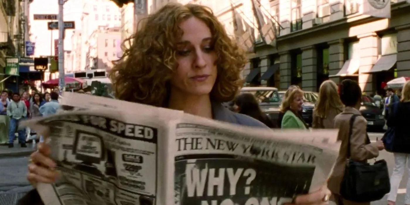Carrie reading a paper in season 1 of SATC