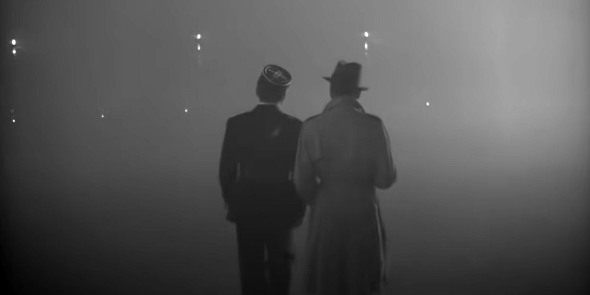The final shot of Casablanca with Humphrey Bogart's back to the camera.