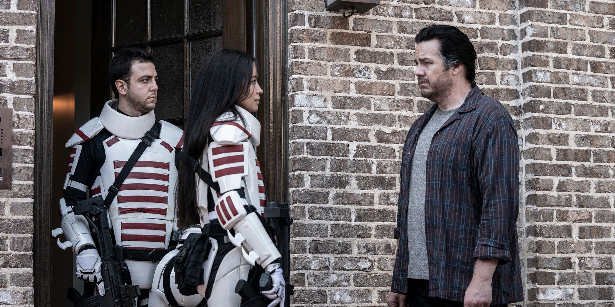 Christian Serratos as Rosita and Josh McDermitt as Eugene in Walking Dead
