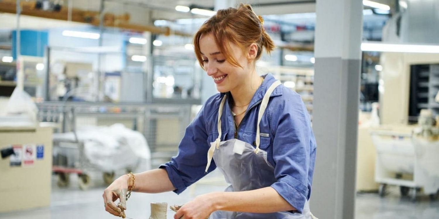 Claire at the pottery wheel in The Colour Room