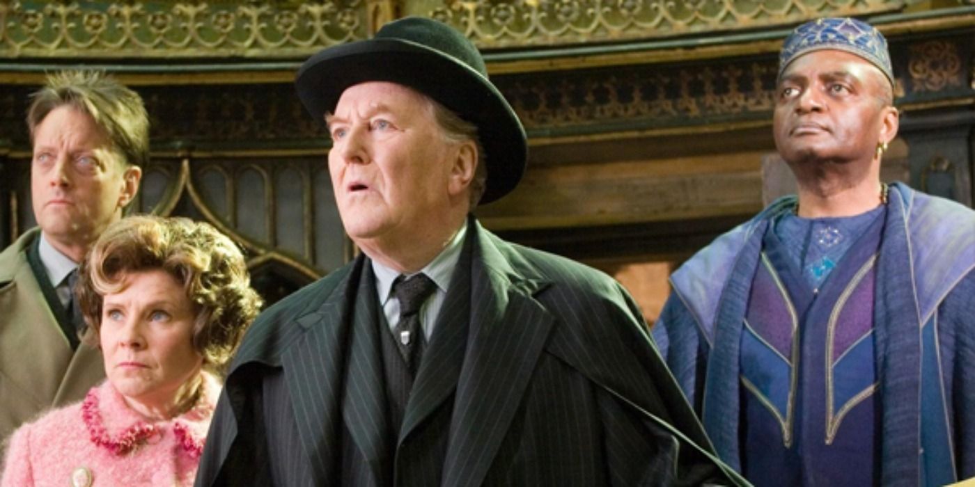 Cornelius Fudge with Umbridge and Shacklebolt in Dumbledore's office