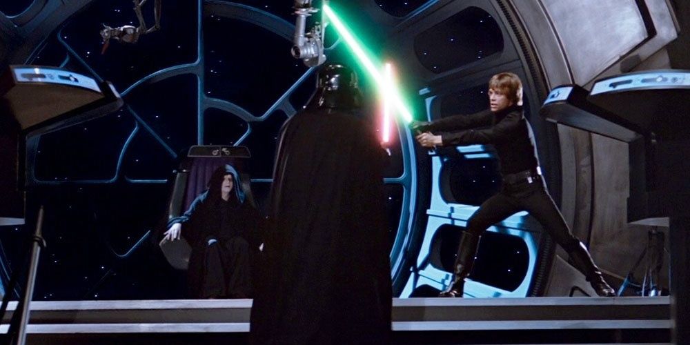 Darth Vader and Luke Skywalker battle with lightsabers in Star Wars Episode VI Return Of The Jedi 