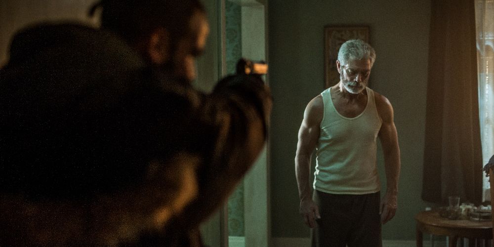 The Blind Man has a gun pointed at him in Don't Breathe