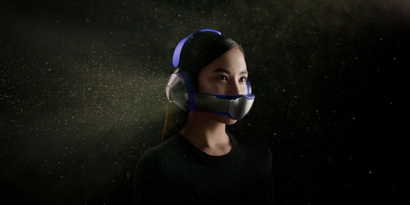 Woman wearing Dyson Zone headphones with air purifier