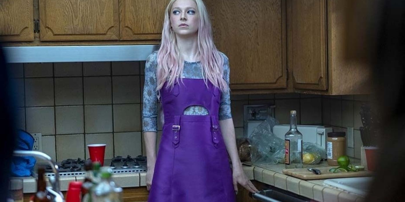 Jules standing in a kitchen looking confused in Euphoria