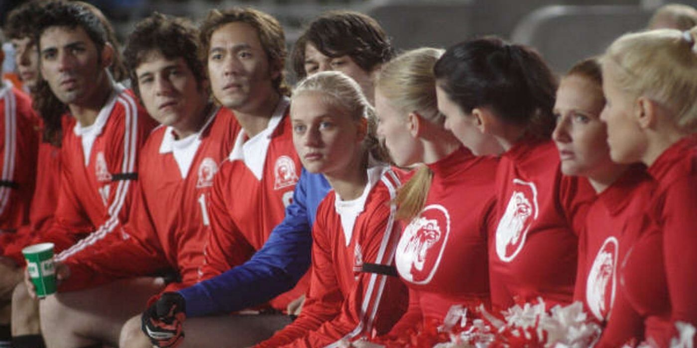 Gracie Bowen sitting with the varsity soccer team in place of her brother in the film Gracie