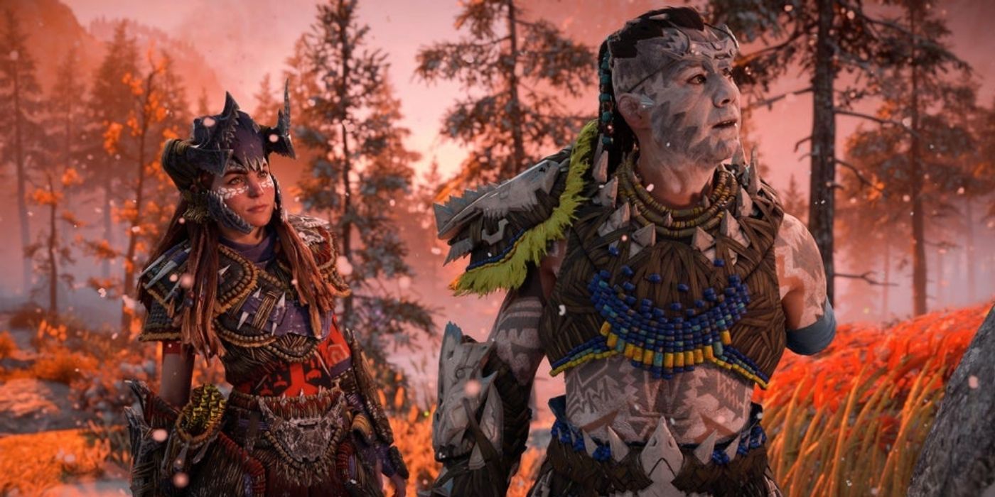 Kotallo and Aloy walking through a forest in Horizon Forbidden West