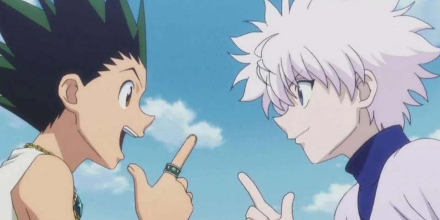 Gon and Killua looking at each other and smiling in Hunter x Hunter