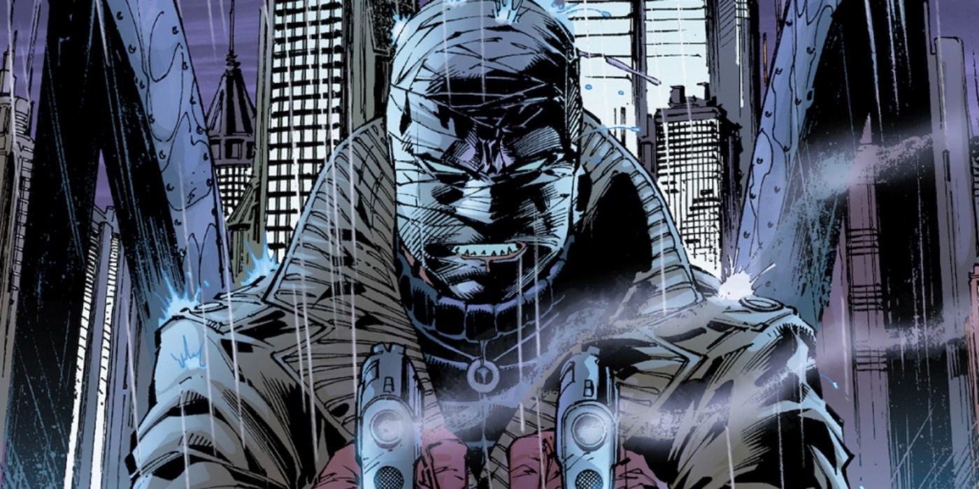 Hush aiming two guns at someone in DC comics.