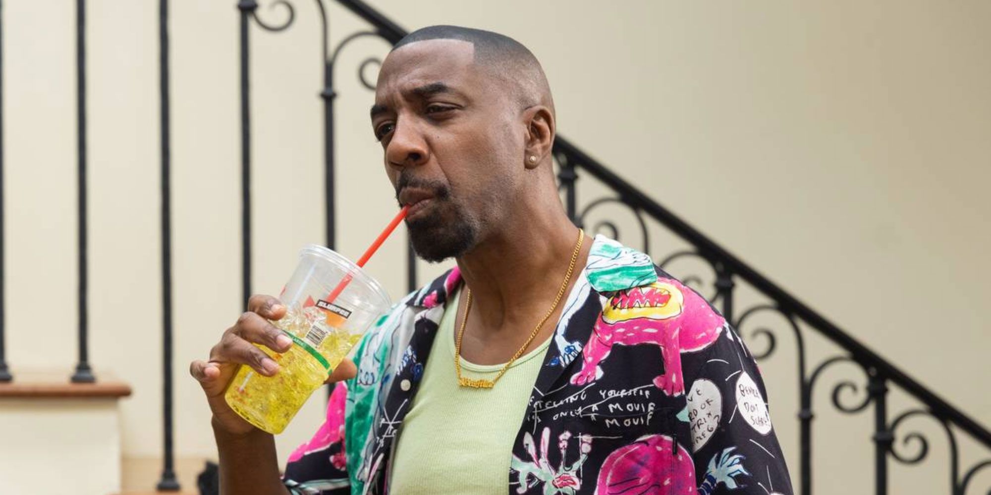 JB Smoove drinking from a plastic cup