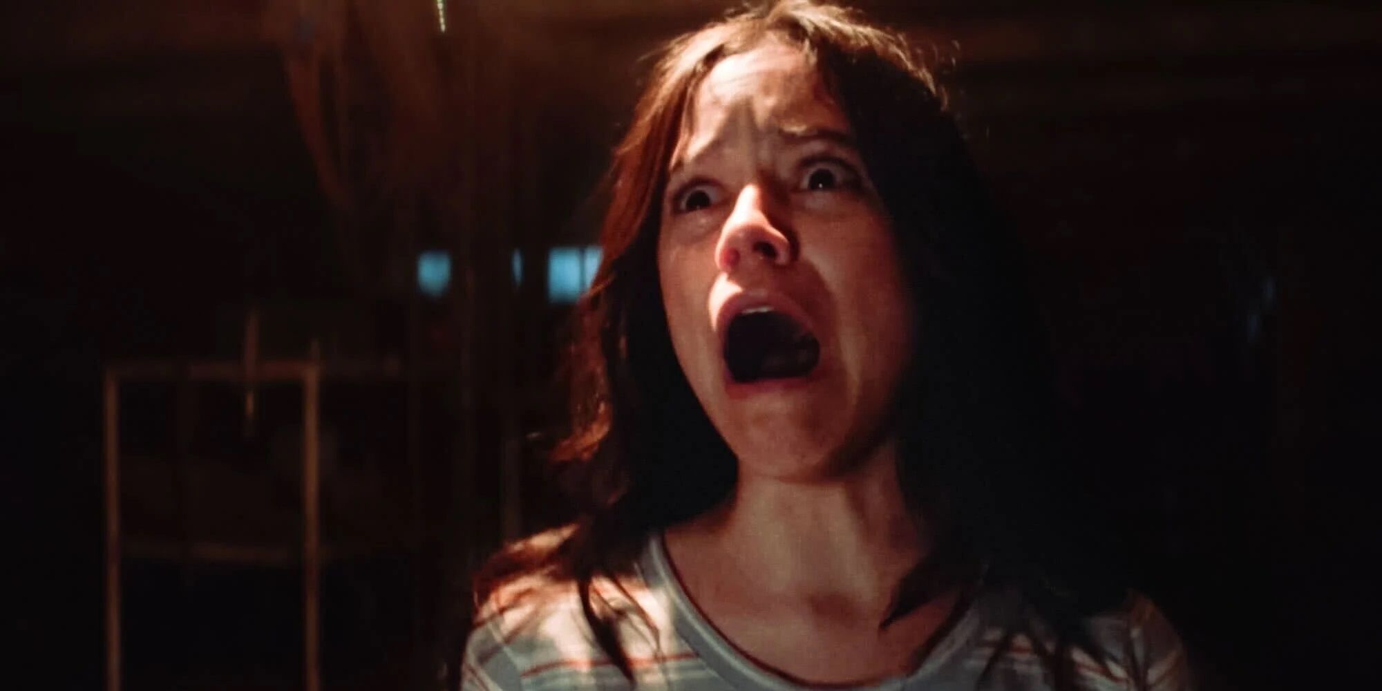 Jenna Ortega screaming in a basement in X