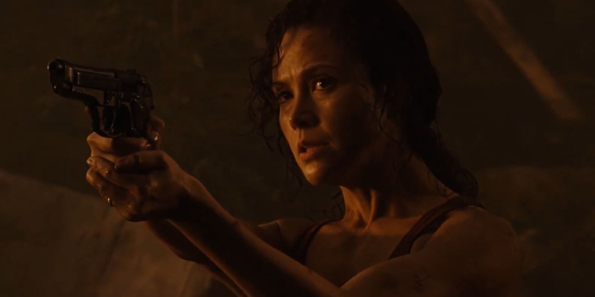 Kelly O'Brien aiming a pistol in Alien Vs. Predator Requiem