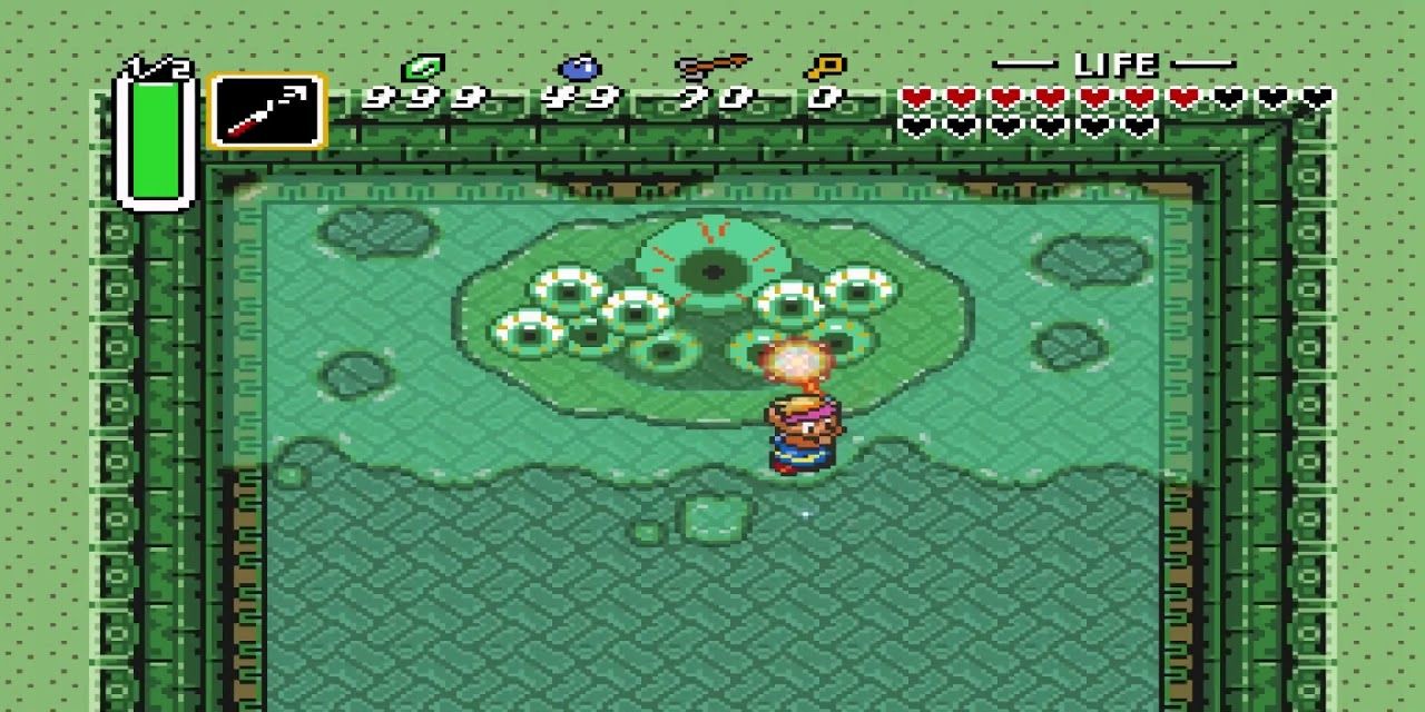 Link fighting the boss Vitreous in A Link to the Past