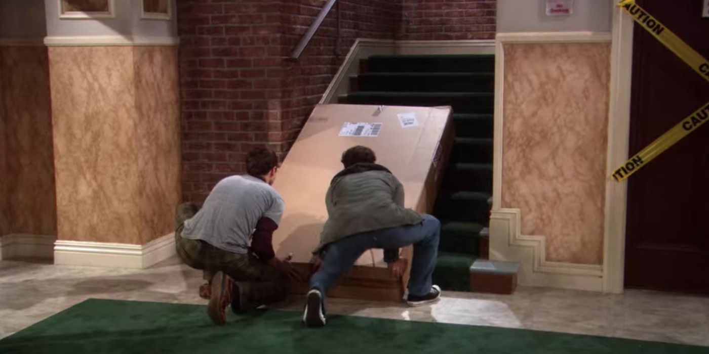 Leonard and Sheldon moving up the stairs on TBBT