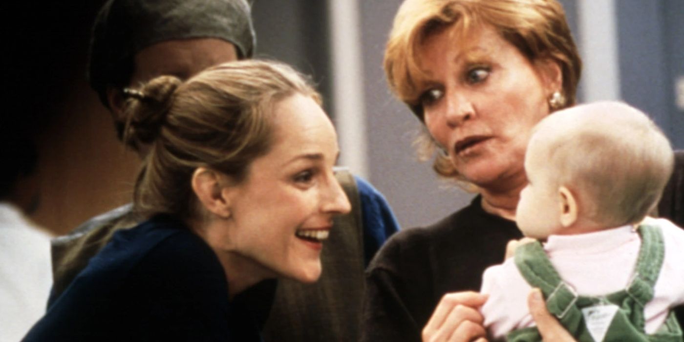 Jamie smiling as Sylvia holds baby Mabel on Mad About You