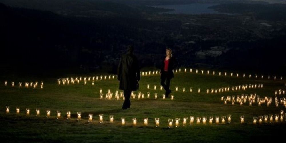Meredith and Derek reunite in a field filled with candles in Grey&rsquo;s Anatomy
