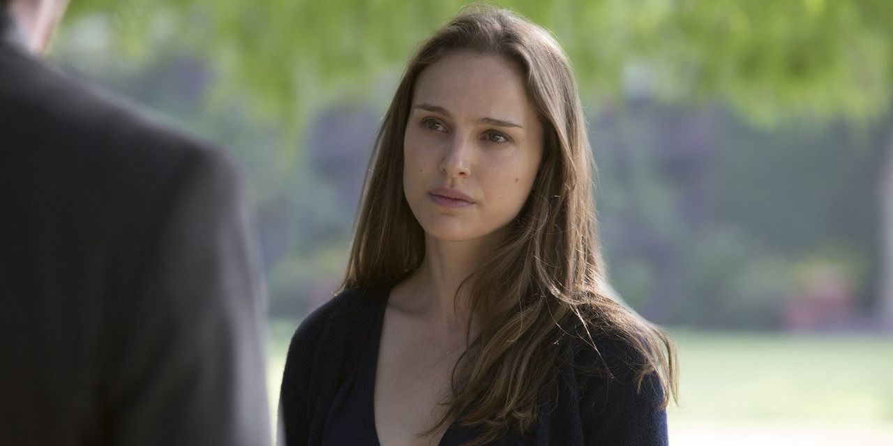 Natalie Portman standing in a field in Knight of Cups