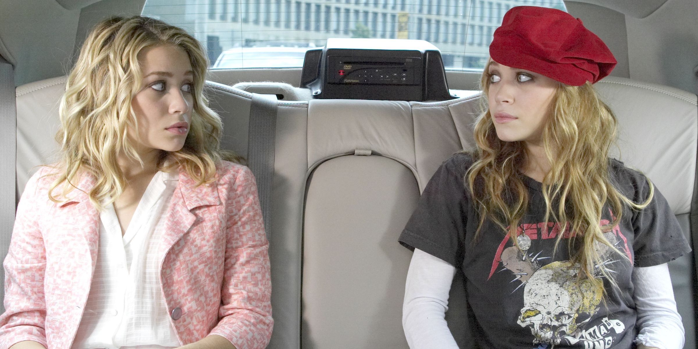 Mary-Kate and Ashley Olsen in a car in New York Minute
