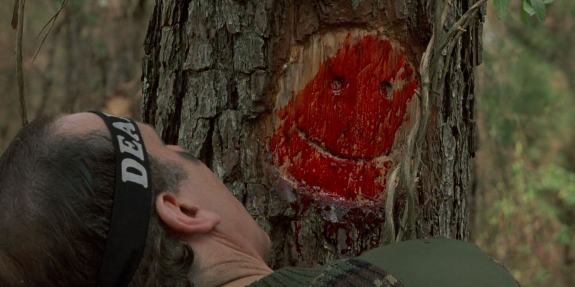 Paintballer being slammed into a tree thus creating a smiley face in Friday The 13th Part VI Jason Lives
