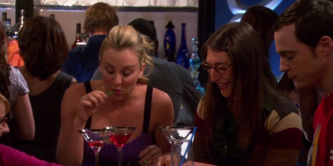 Penny and Amy getting drinks with Sheldon on TBBT