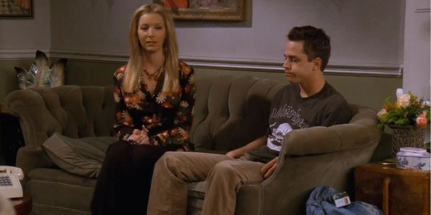 Phoebe and Frank Jr. Sitting on Phoebe's Couch in Awkward Silence While Trying To Bond