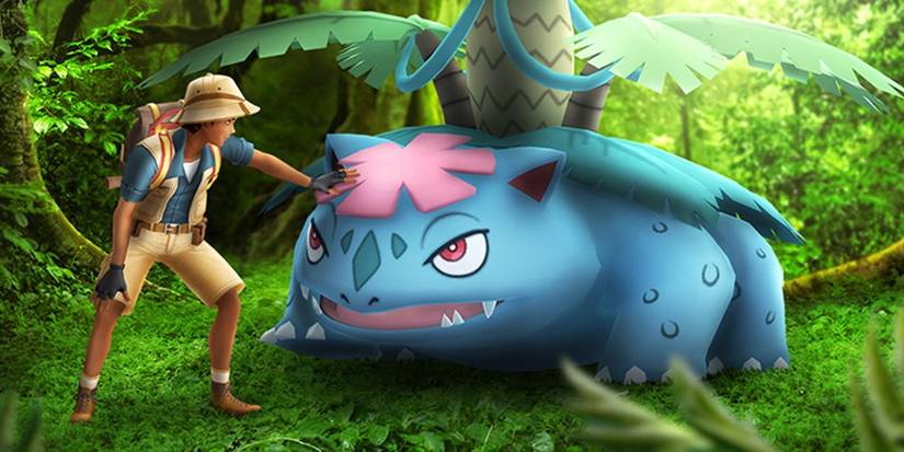 A Trainer pets a Mega Venusaur in Pokemon GO.