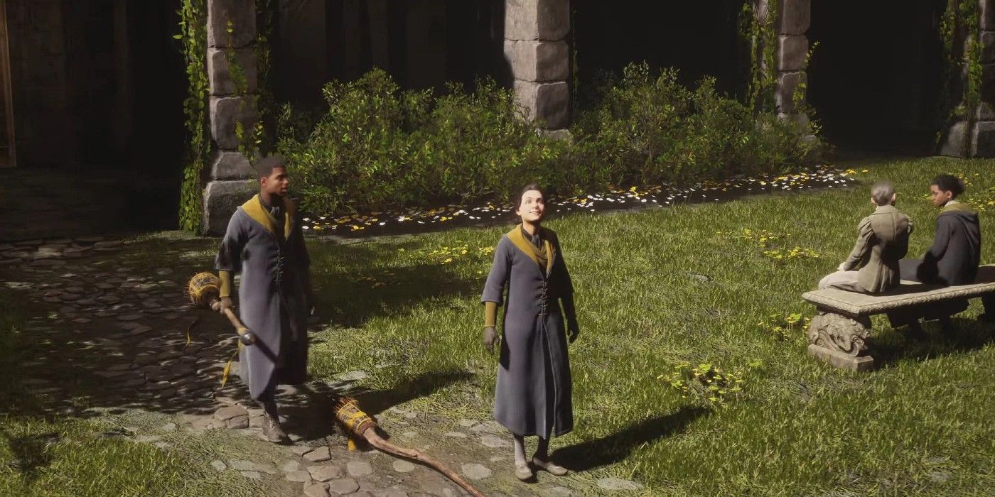 Two Hufflepuff students with brooms outside in Hogwarts Legacy.