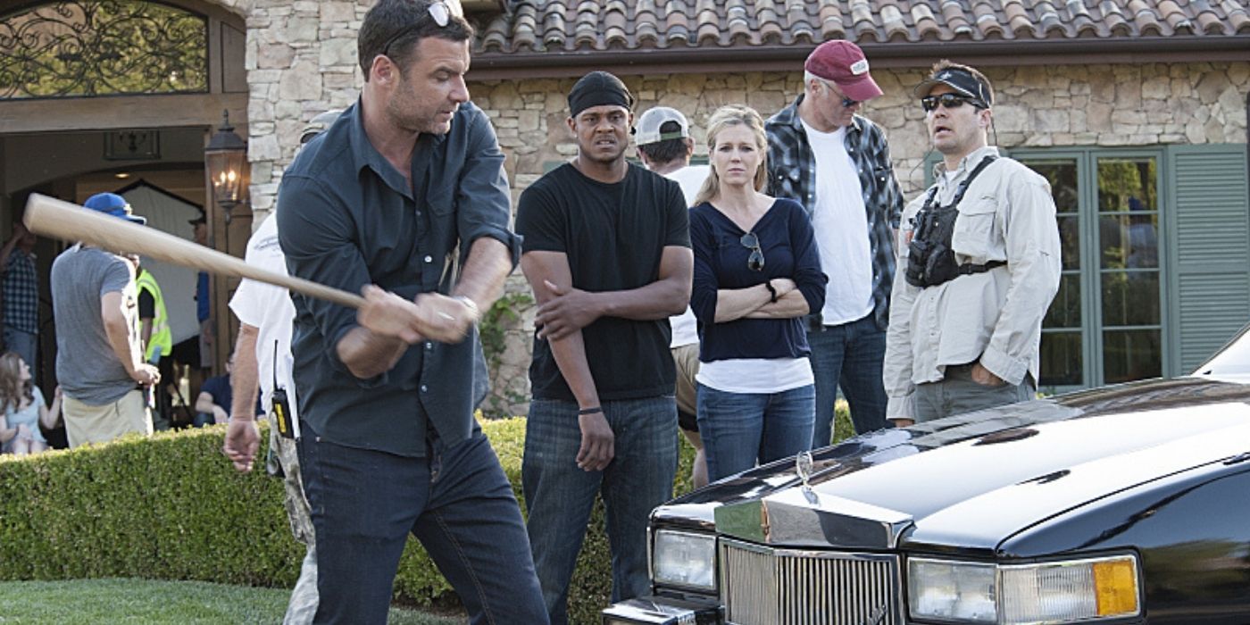Ray about to bash a car with a bat in Ray Donovan