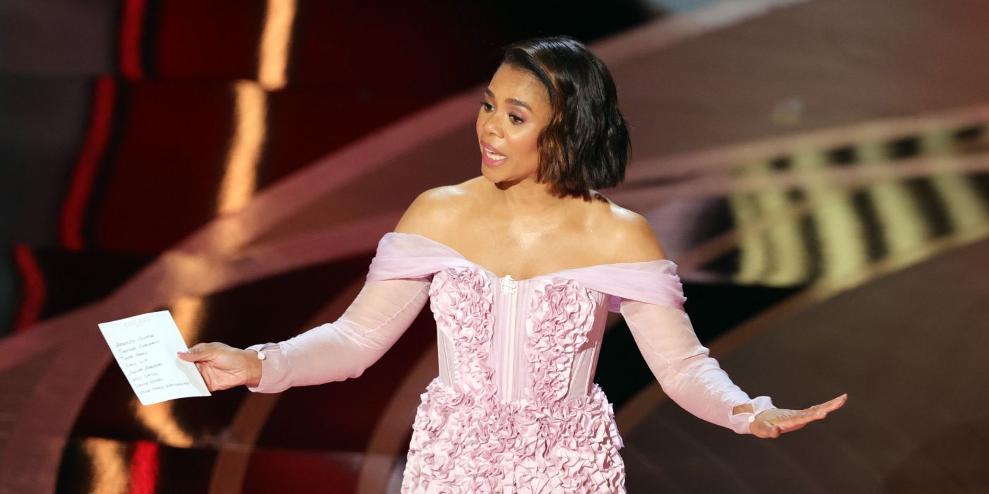 Regina Hall on stage delivering jokes during The Oscars