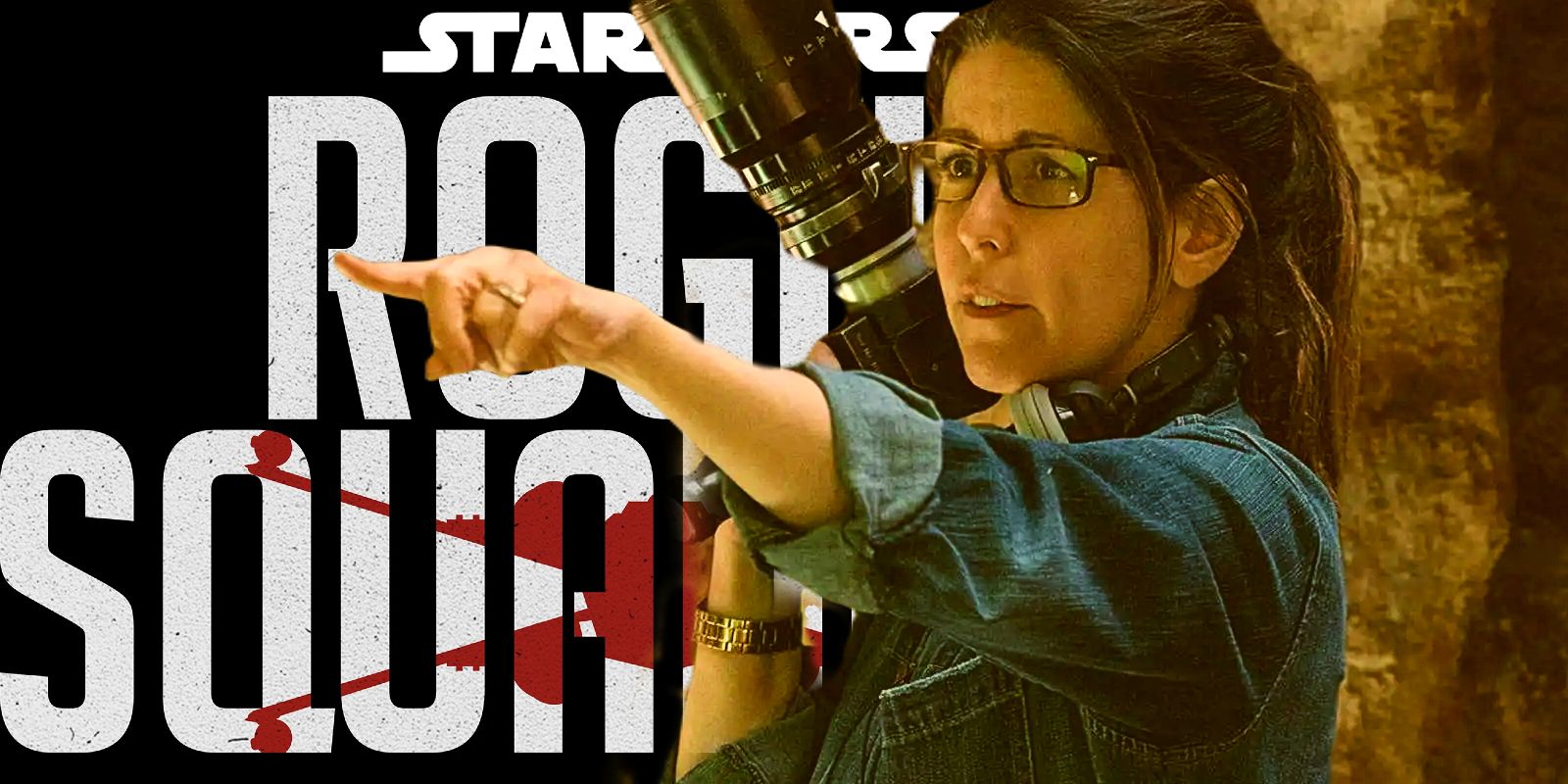Director Patty Jenkins stands pointing in front of the Rogue Squadron logo 
