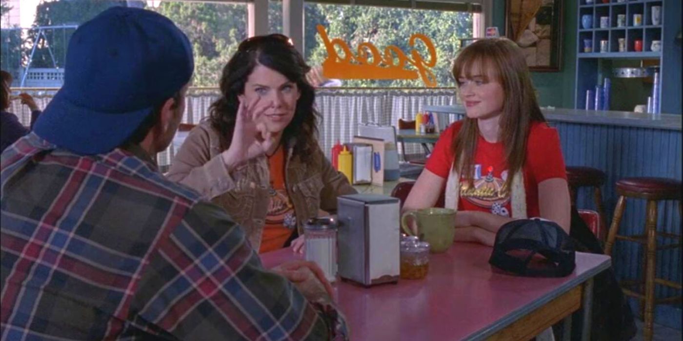 Rory and Lorelai talking to Luke at the diner on Gilmore Girls