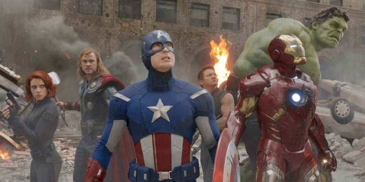 Black Widow, Hawkeye, Captain America, Iron Man, and Hulk standing together in the Battle of New York in The Avengers