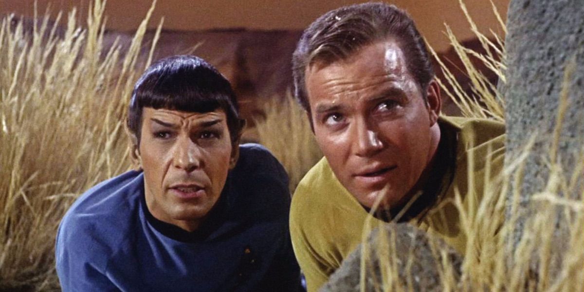 Kirk and Spock duck for cover from And The Children Shall Lead 