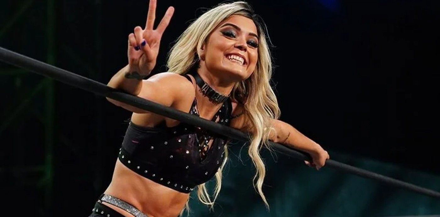 Tay Conti with a peace sign in AEW 