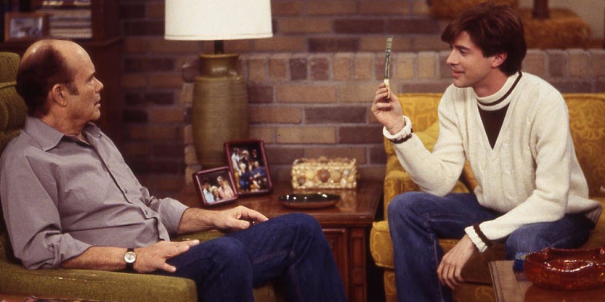 Red and Eric talk on the couch from That 70s Show