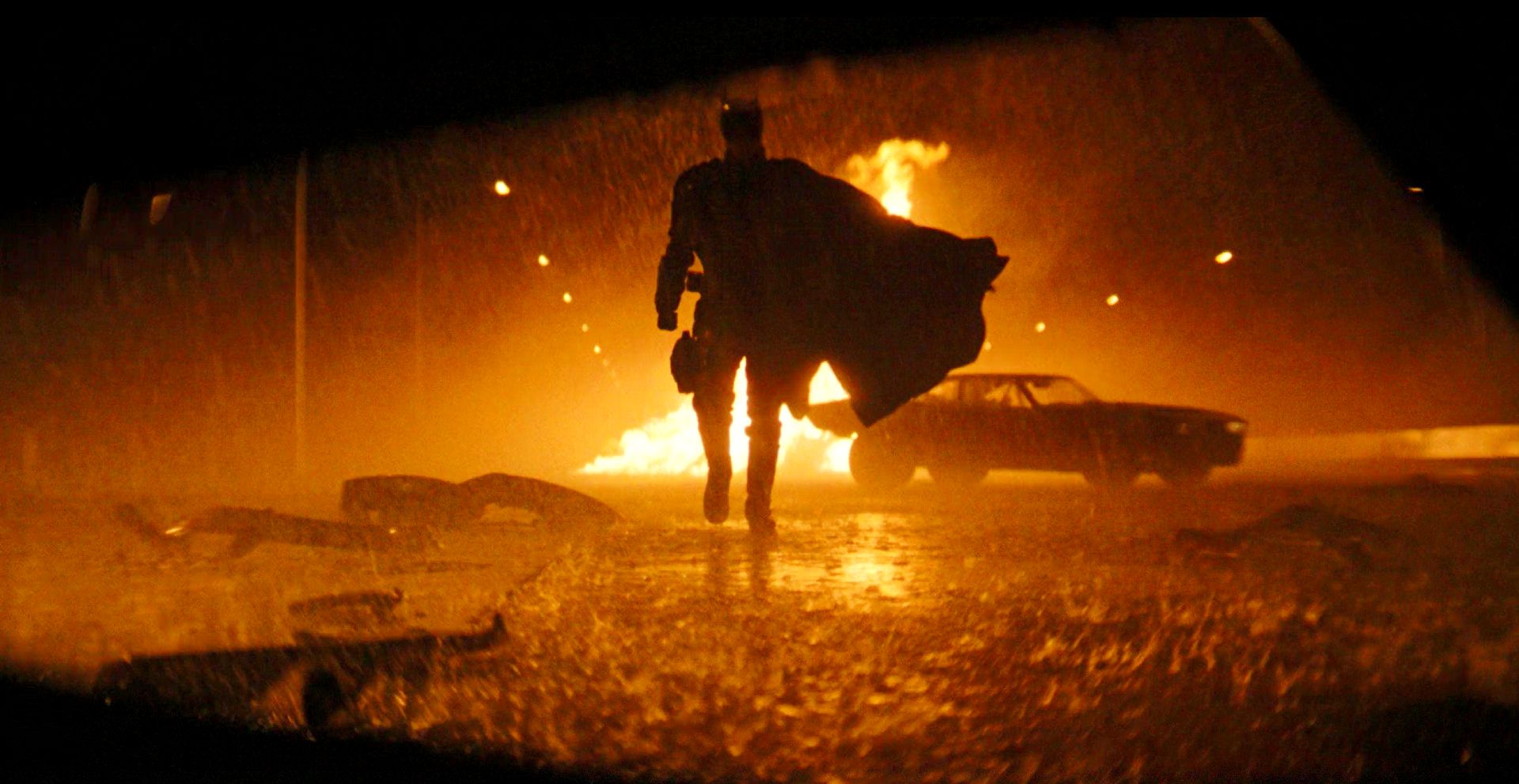 The Batman scene with Batman walking in front of the Batmobile
