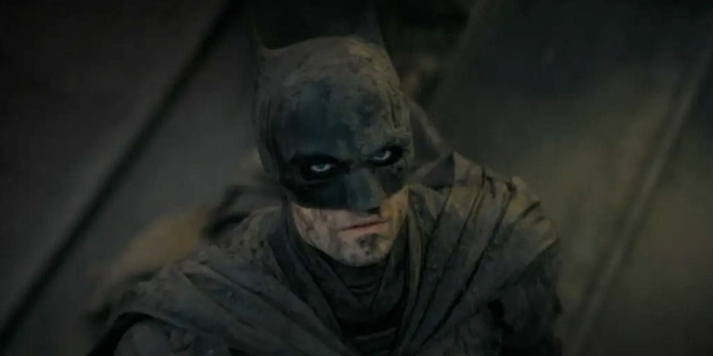 Batman soaked in floodwaters and mud