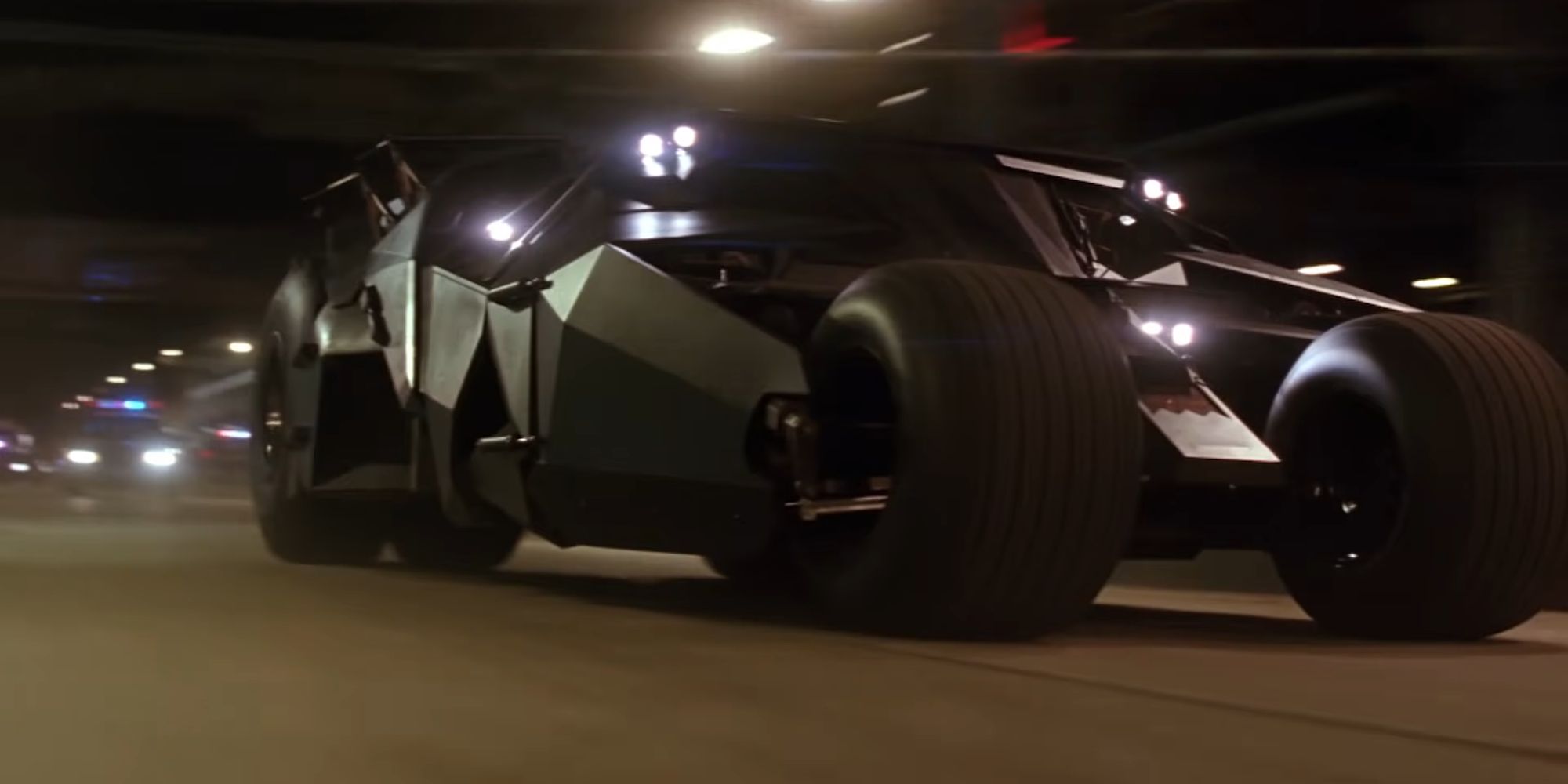 The Batmobile being chased by the police in Batman Begins