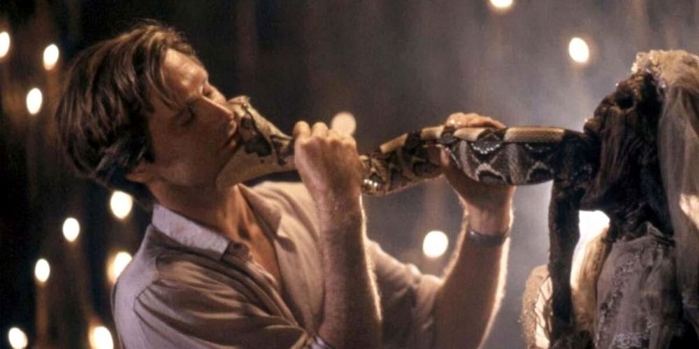 Bill Pullman gets bitten by a snake in a voodoo ceremony in The Serpent and the Rainbow