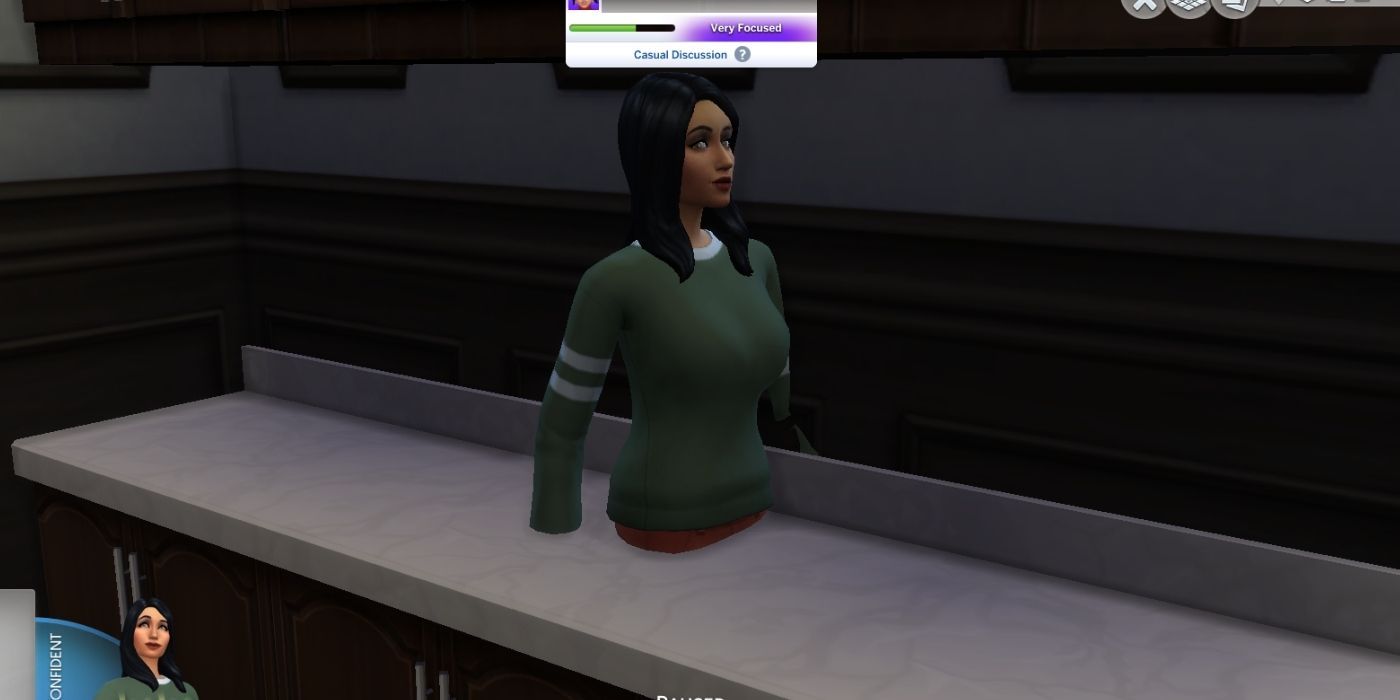 A sim stuck in a table in The Sims 4