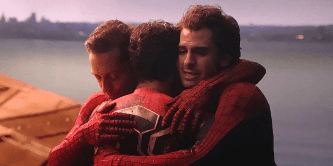 The Spider-Men hug each other in No Way Home