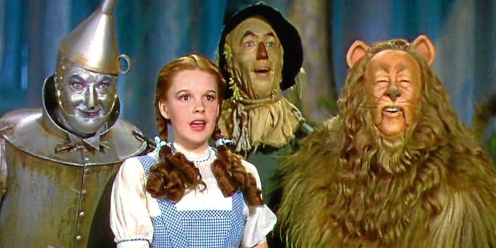 Dorthy, the Tin Man, Scarecrow, and the Cowardly Lion look towards to Emerald City