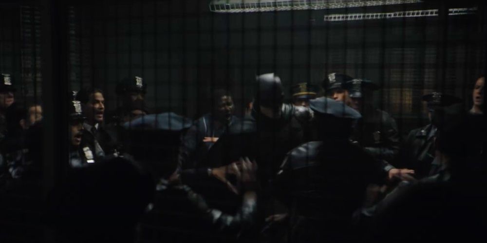 The police ambush Batman at the station