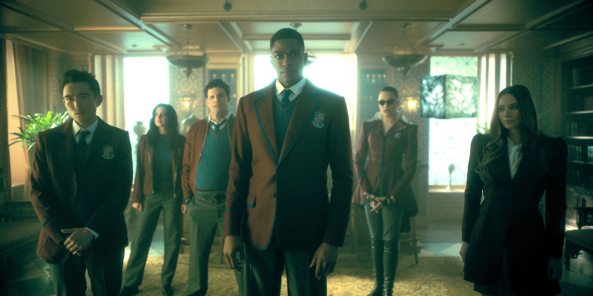 Justin H. Min as Ben Hargreeves, Cazzie David as Jayme, Jake Epstein as Alphonso, Justin Cornwell as Marcus, Britne Oldford as Fei, Genesis Rodriguez as Sloane from the Sparrow Academy in The Umbrella Academy Season 3