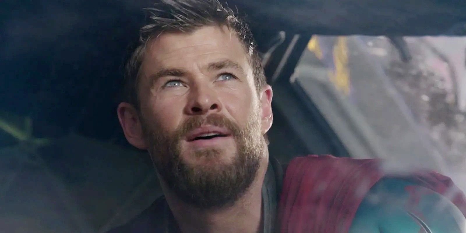 Thor smiling and looking up in Thor: Ragnarok