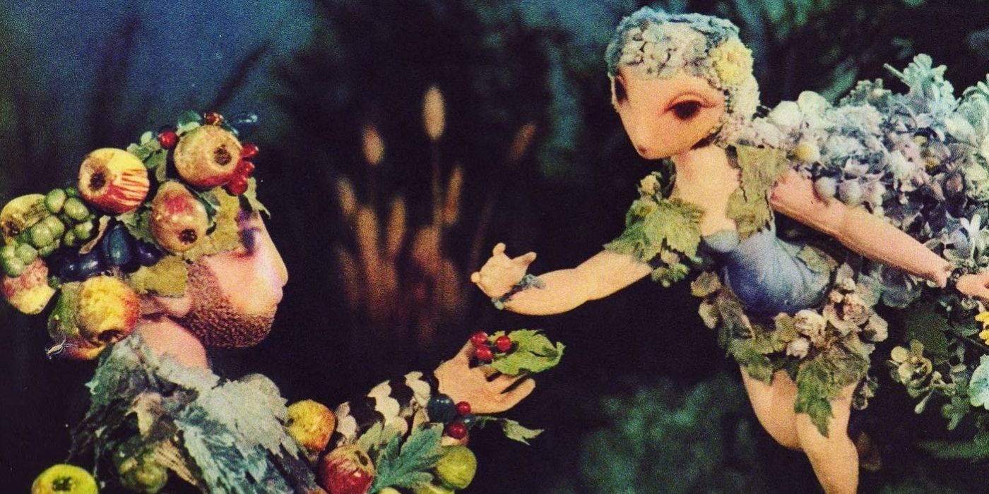 Two characters reaching out in A Midsummer Night s Dream 1959